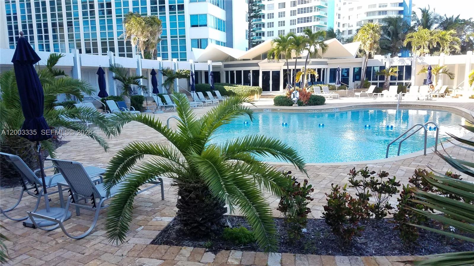 Pool with gym by beach — MIAMI BEACH, FL