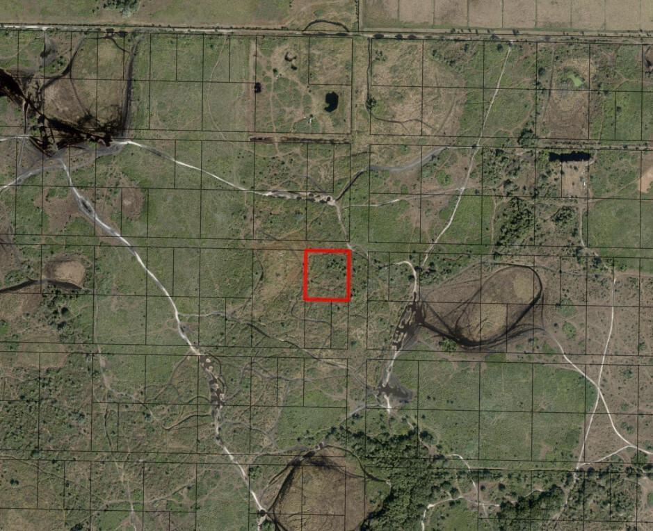 This is an aerial map showing a red-outlined parcel of land within a grid — 0 NW 316th Street, Okeechobee FL 34972, OKEECHOBEE, FL
