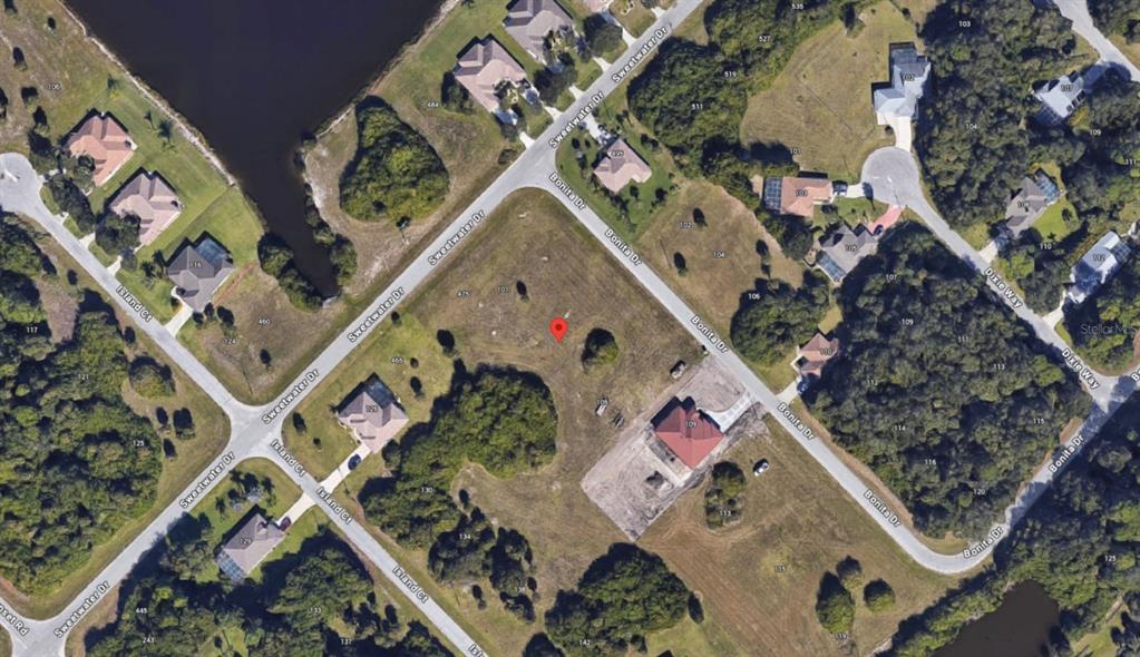 This aerial map shows a vacant residential lot situated between Sweetwater Drive and Bonita Drive — 103 BONITA DRIVE, ROTONDA WEST, FL