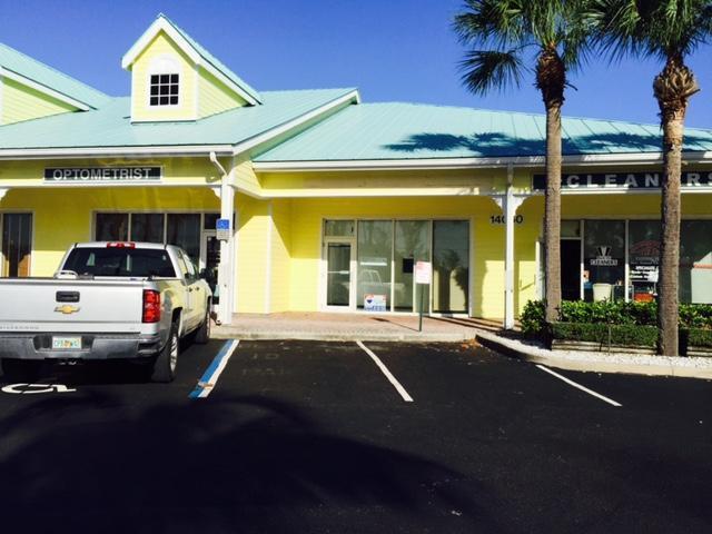A yellow commercial building with a teal roof and a parked silver pickup truck — 14050 Us Highway 1 # F, Juno Beach FL 33408, JUNO BEACH, FL