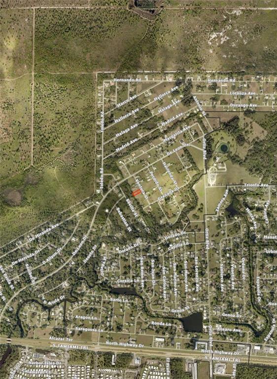 This is an aerial map showing a residential neighborhood with a highlighted plot of land — Lot 7 VENTURA STREET, NORTH PORT, FL
