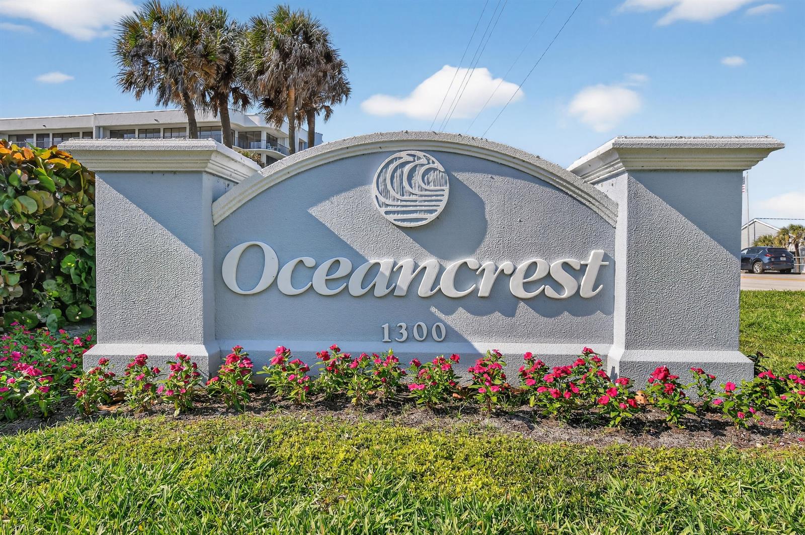 A light gray monument sign with the name Oceancrest stands in front of a building — 1300 S Highway A1a # 320, Jupiter FL 33477, JUPITER, FL
