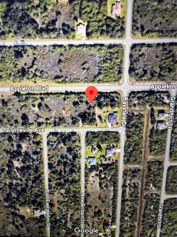 This is a satellite map view showing a vacant residential lot marked with a pin — 13337 APPLETON BOULEVARD, PORT CHARLOTTE, FL