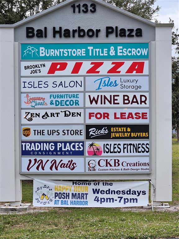 A multi-tenant monument sign displays the names of various businesses at Bal Harbor Plaza — 1125,1127,1131 BAL HARBOR BOULEVARD UNIT 1125, PUNTA GORDA, FL