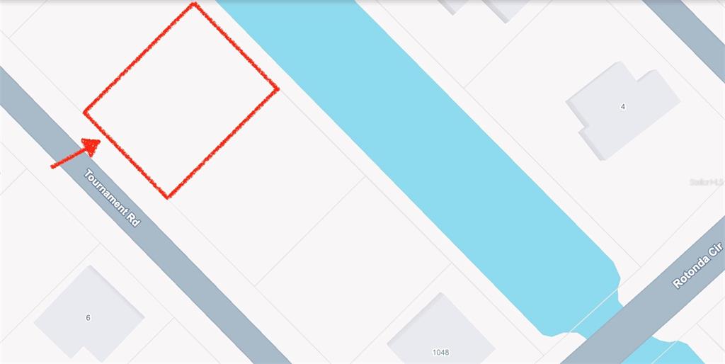 This map shows a vacant lot outlined in red along Tournament Road — 7 TOURNAMENT ROAD, ROTONDA WEST, FL