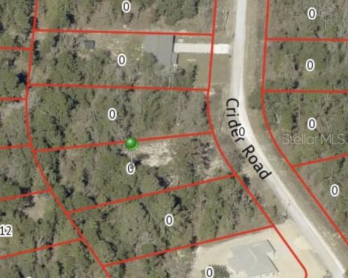This is a satellite map view showing a vacant plot of land along Crider Road — 16221 CRIDER ROAD, BROOKSVILLE, FL