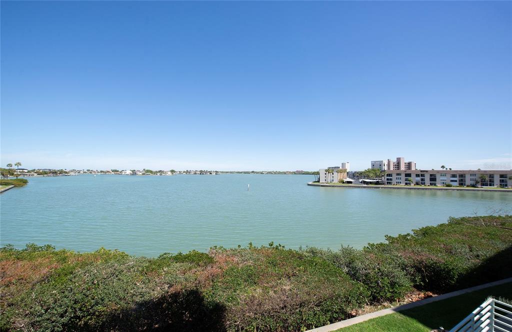 A view of a calm bay with residential buildings on the distant shore — 7979 SAILBOAT KEY BOULEVARD S UNIT 208, SOUTH PASADENA, FL