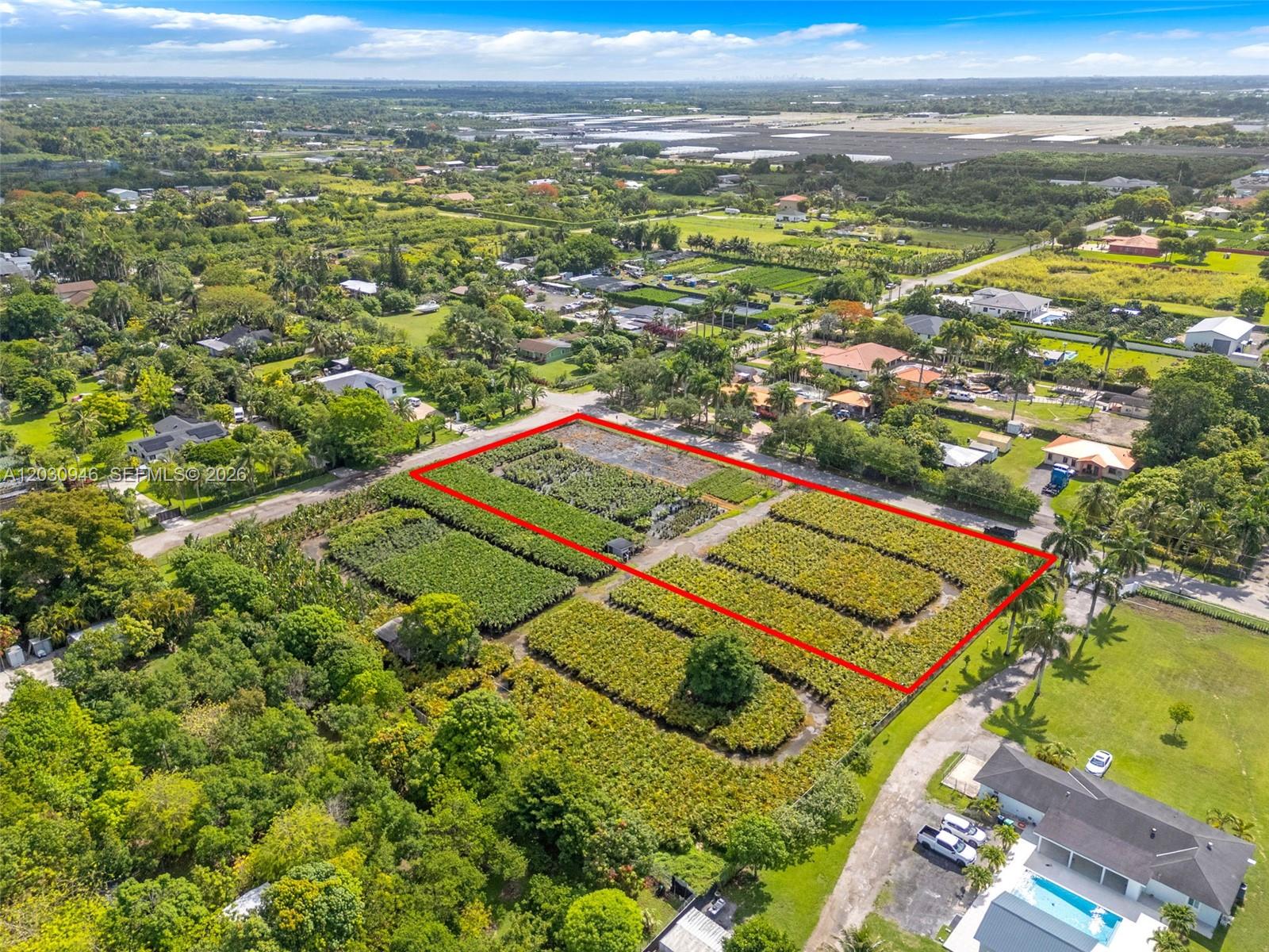 An aerial view shows a rectangular plot of land filled with rows of nursery plants — 208 st SW 198 av, Miami FL 33187, MIAMI, FL