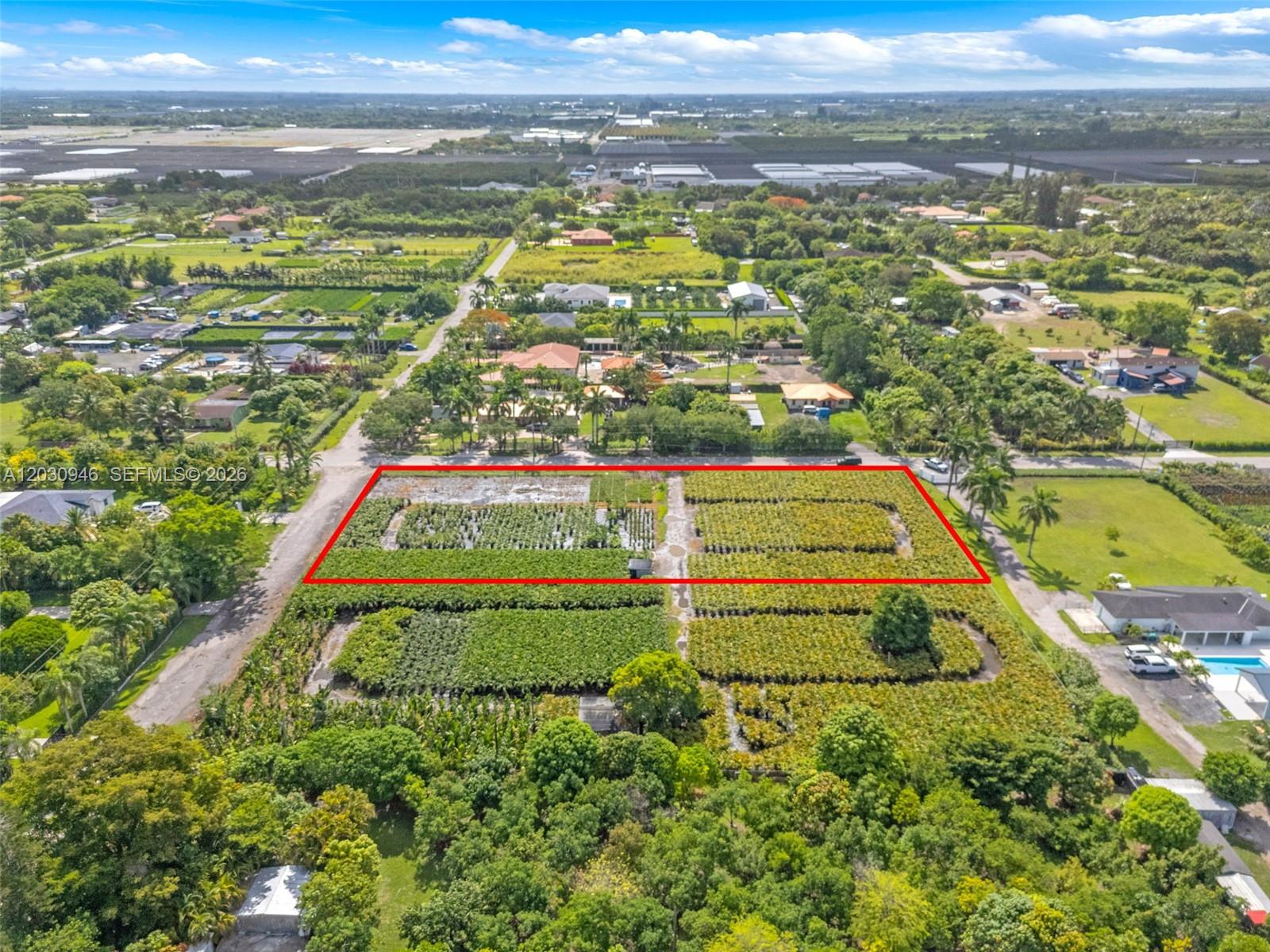 An aerial view shows a rectangular plot of land used for a plant nursery — 208 st SW 198 av, Miami FL 33187, MIAMI, FL