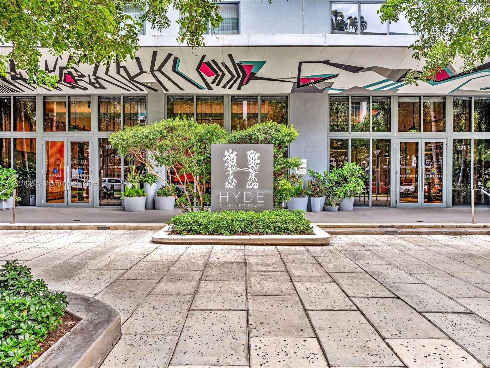 The exterior entrance of the Hyde Suites and Residences features a large branded sign — 121 NE 34th St # 1005, Miami FL 33137, MIAMI, FL