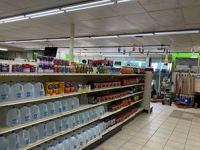 The interior of a convenience store features long aisles of shelves stocked with various products — 5600 NE 2nd Ave # A, Miami FL 33137, MIAMI, FL