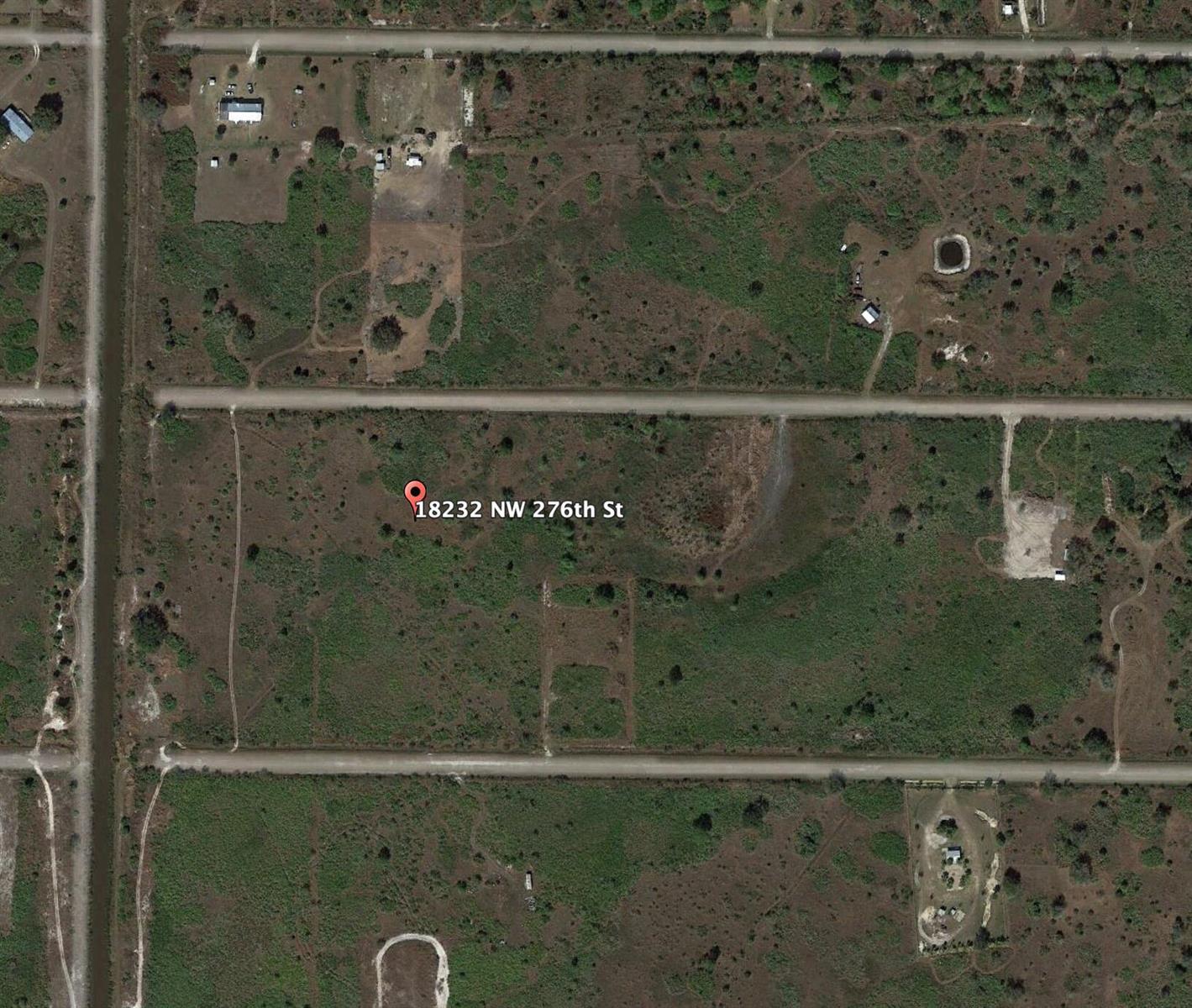 This aerial map shows a large, undeveloped rectangular plot of land with sparse vegetation — 18232 NW 276th Street, Okeechobee FL 34972, OKEECHOBEE, FL