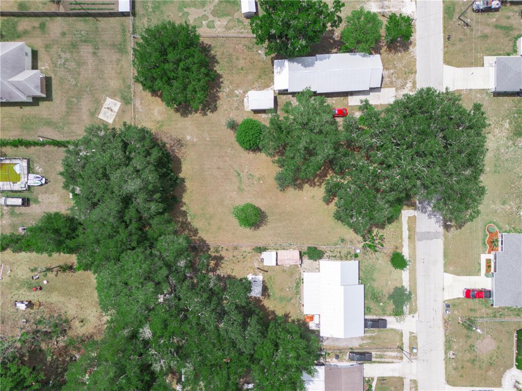 This aerial view shows a rectangular plot of land highlighted as .36 acres — 0 S PERRY AVENUE, FORT MEADE, FL