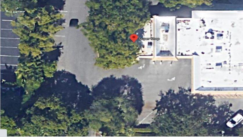 This is an aerial map view of a commercial building with a parking lot — 6900 CYPRESS ROAD, PLANTATION, FL