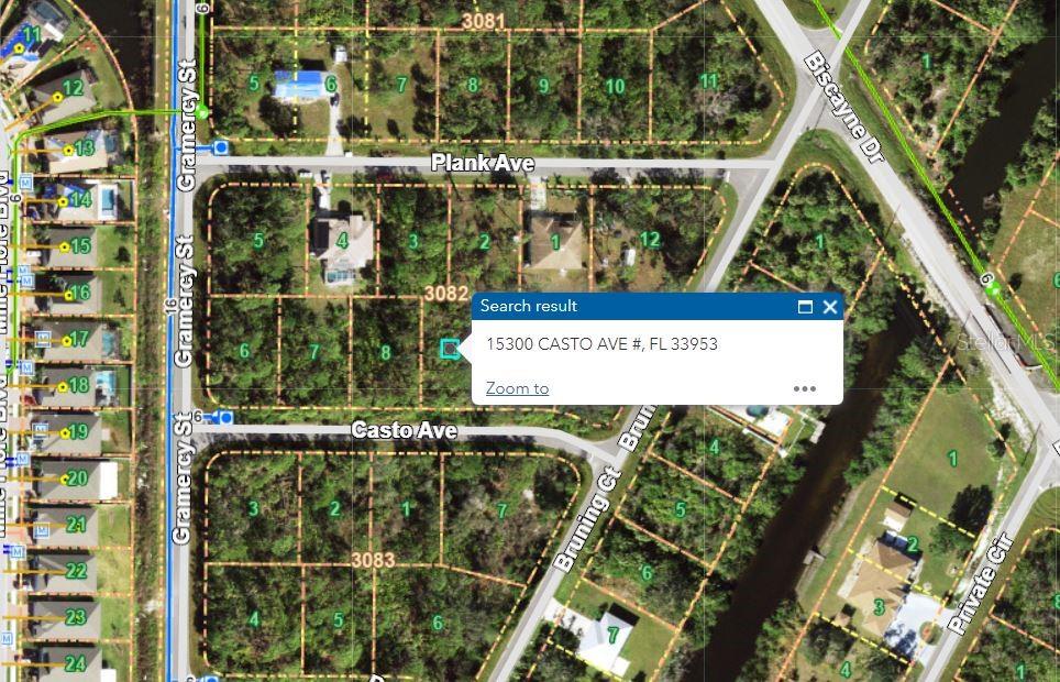 This is a satellite map view showing residential lots, streets, and property boundaries — 15300 CASTO AVENUE, PORT CHARLOTTE, FL