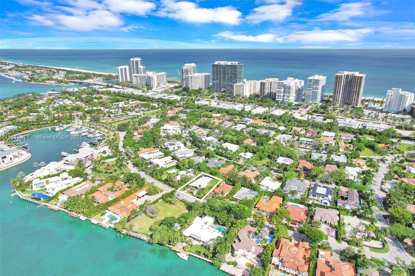 An aerial view shows a residential neighborhood with a highlighted house near the water — 145 Bal Bay Dr, Bal Harbour FL 33154, BAL HARBOUR, FL
