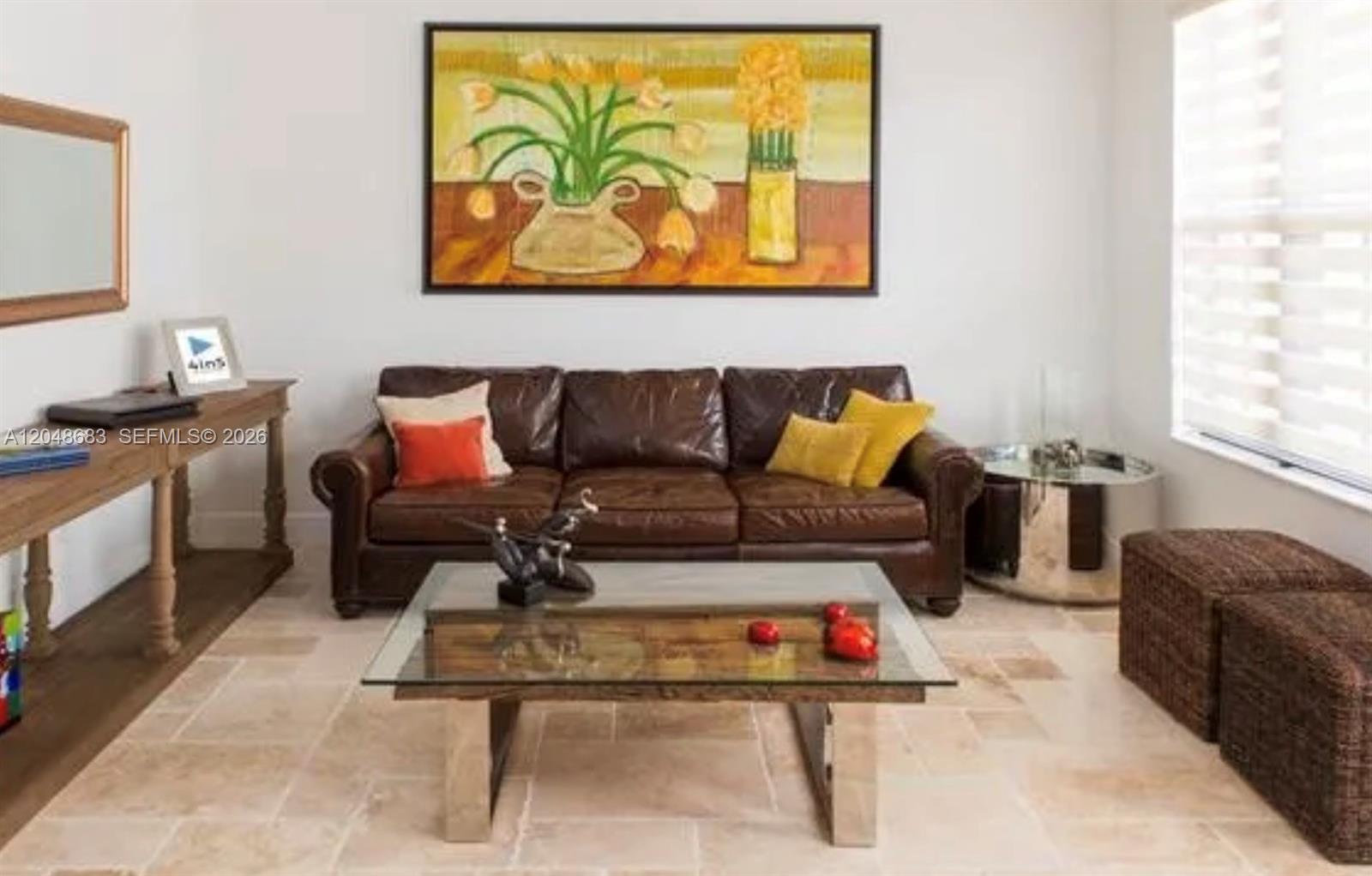 A living room features a brown leather sofa, a glass coffee table, and tile flooring — 5184 NW 84th Ave, Doral FL 33166, DORAL, FL