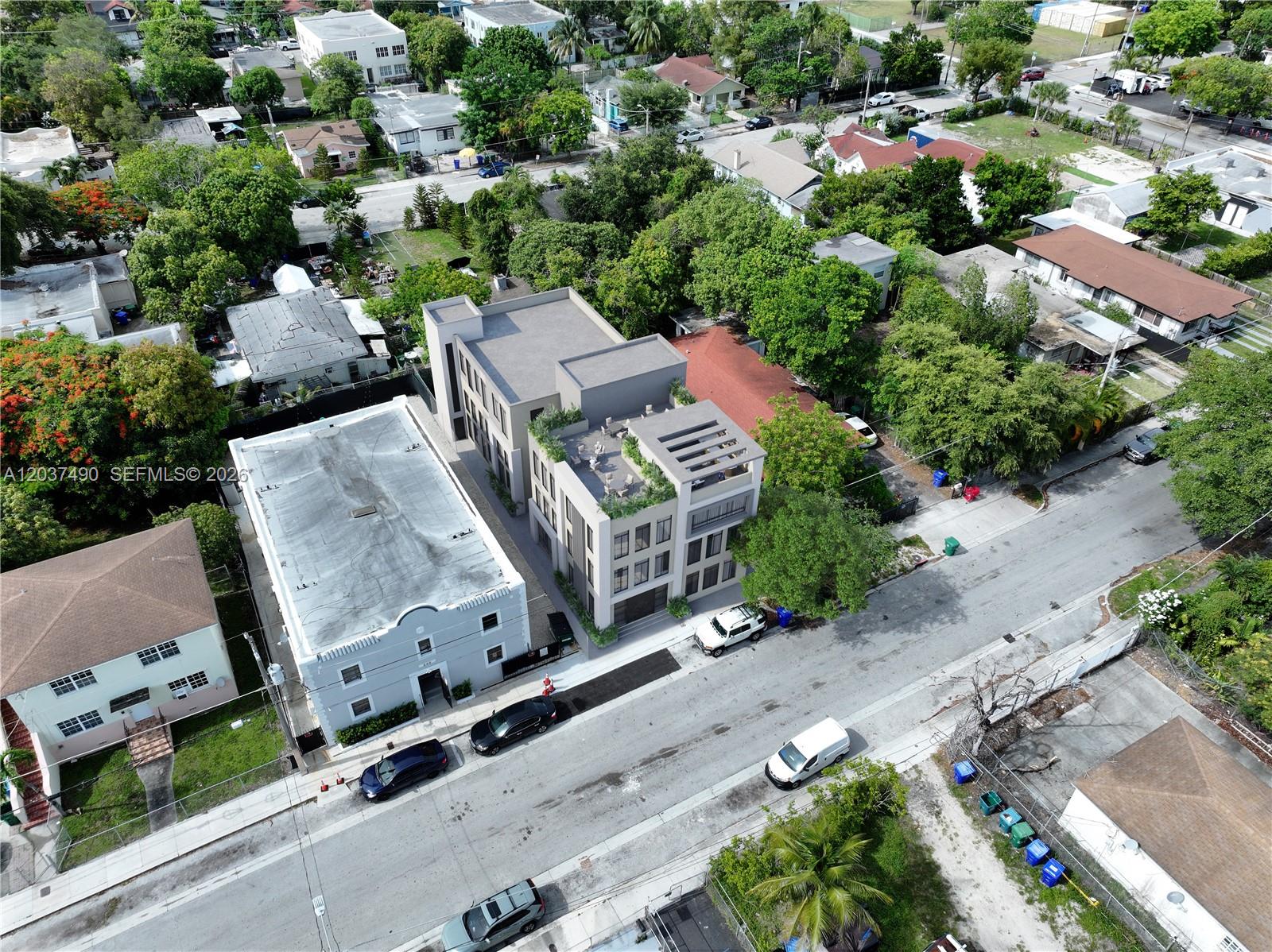 This is an architectural rendering of a modern multi-story building situated on a city street — 243 NW 32nd St, Miami FL 33127, MIAMI, FL