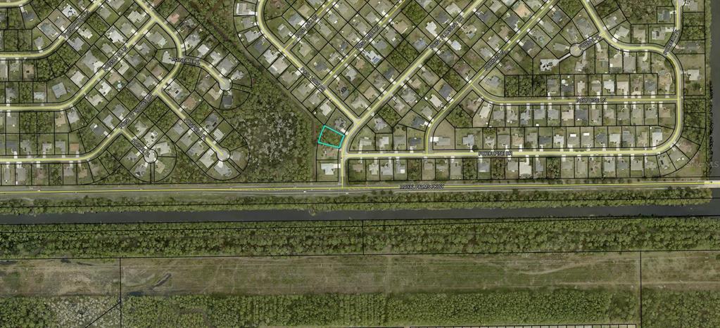This is an aerial map showing a vacant residential lot highlighted in a suburban neighborhood — 188 POINT PLEASANT DRIVE, PALM COAST, FL