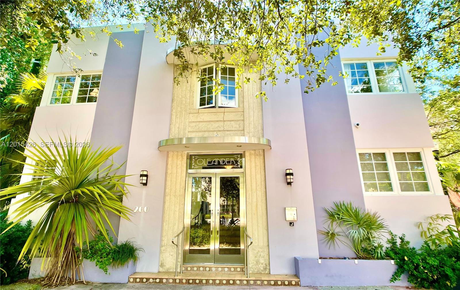 The exterior of a two-story Art Deco building features a central entrance labeled Oleander — 260 Euclid Ave # 24, Miami Beach FL 33139, MIAMI BEACH, FL