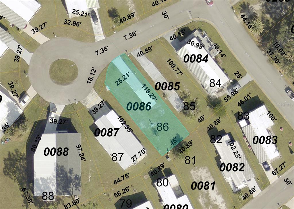 This is a satellite map showing property lot lines and parcel numbers for a residential neighborhood — 6534 HONU (LOT 86) COURT, NORTH PORT, FL