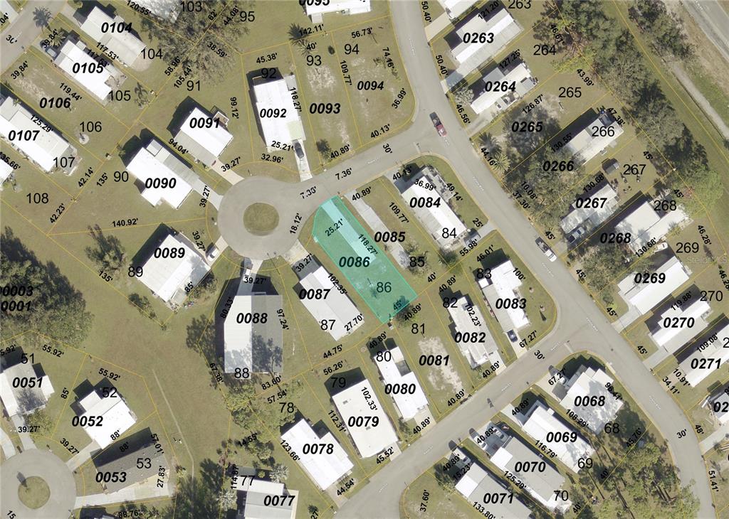 This is a satellite map showing the layout of residential lots and buildings — 6534 HONU (LOT 86) COURT, NORTH PORT, FL