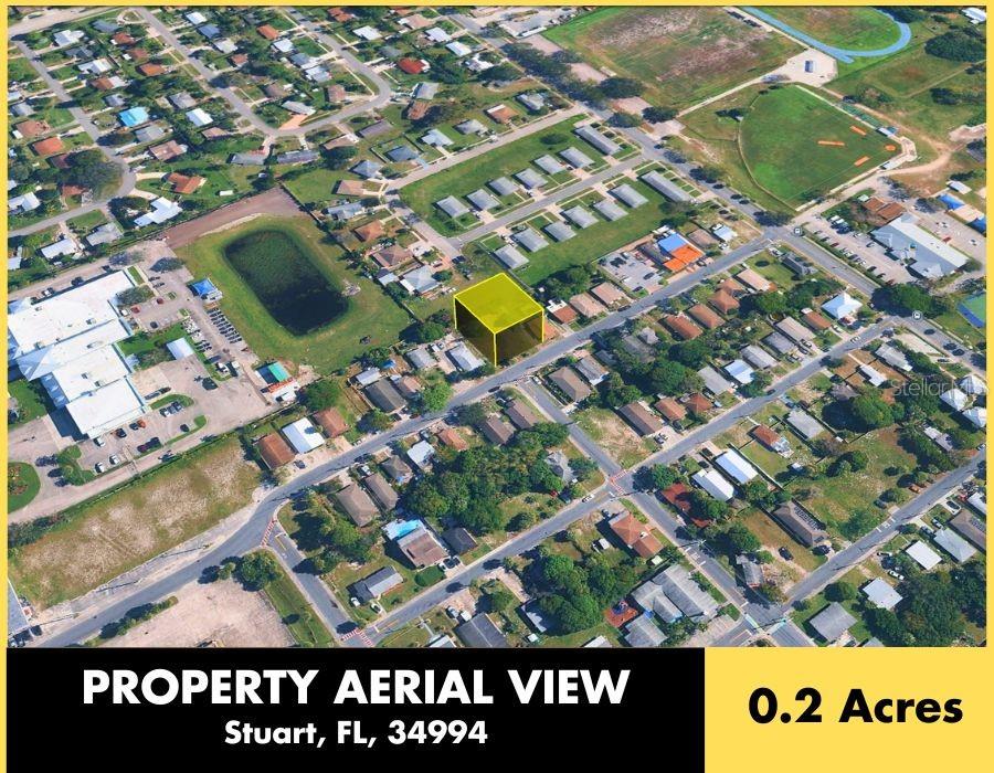 An aerial view shows a highlighted 0.2-acre residential lot in a suburban neighborhood — 833 SE TARPON AVENUE, STUART, FL