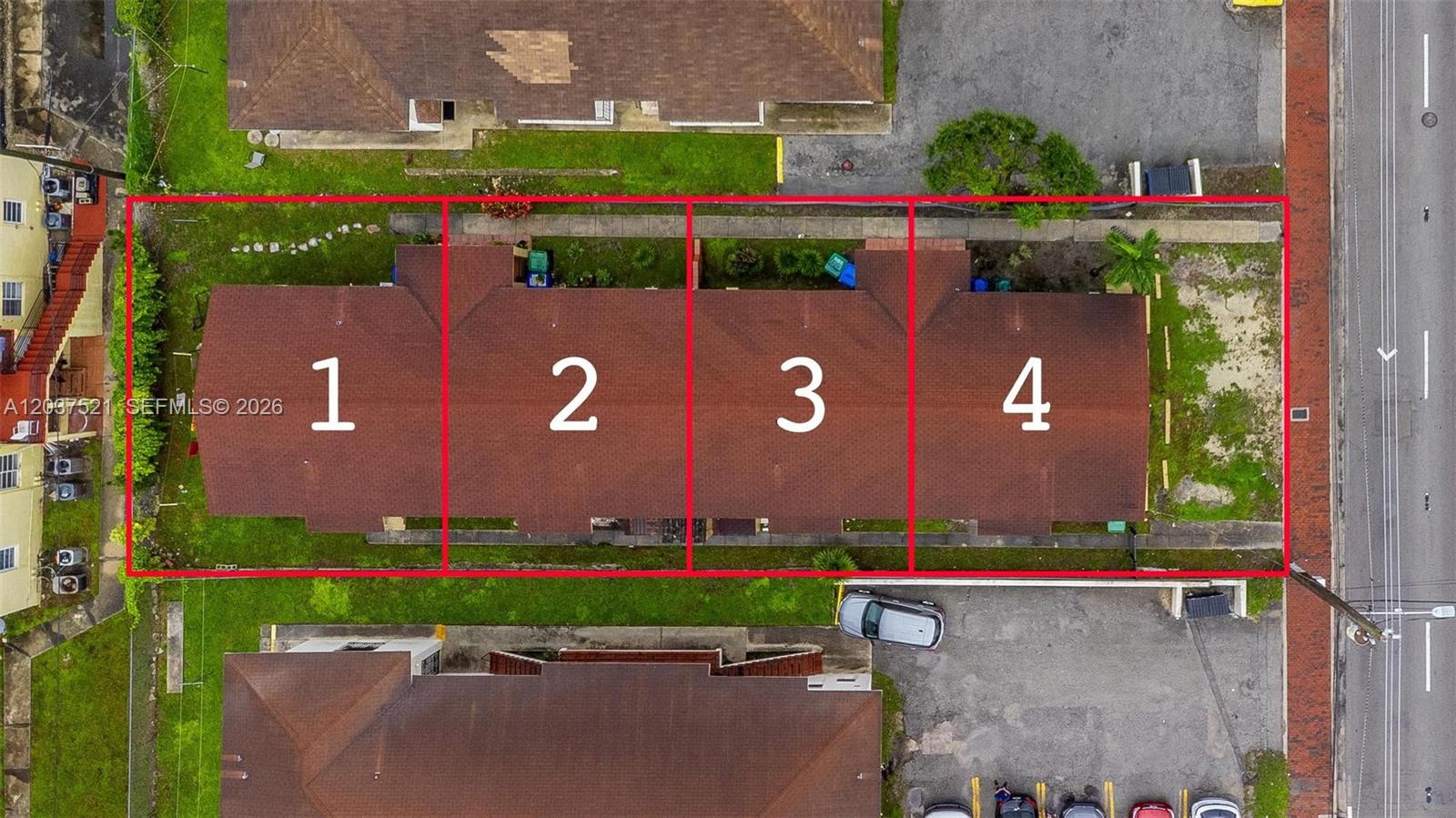 This aerial view shows a four-unit residential building with a brown roof and surrounding grounds — 1345 SW 7th ST, Miami FL 33135, MIAMI, FL