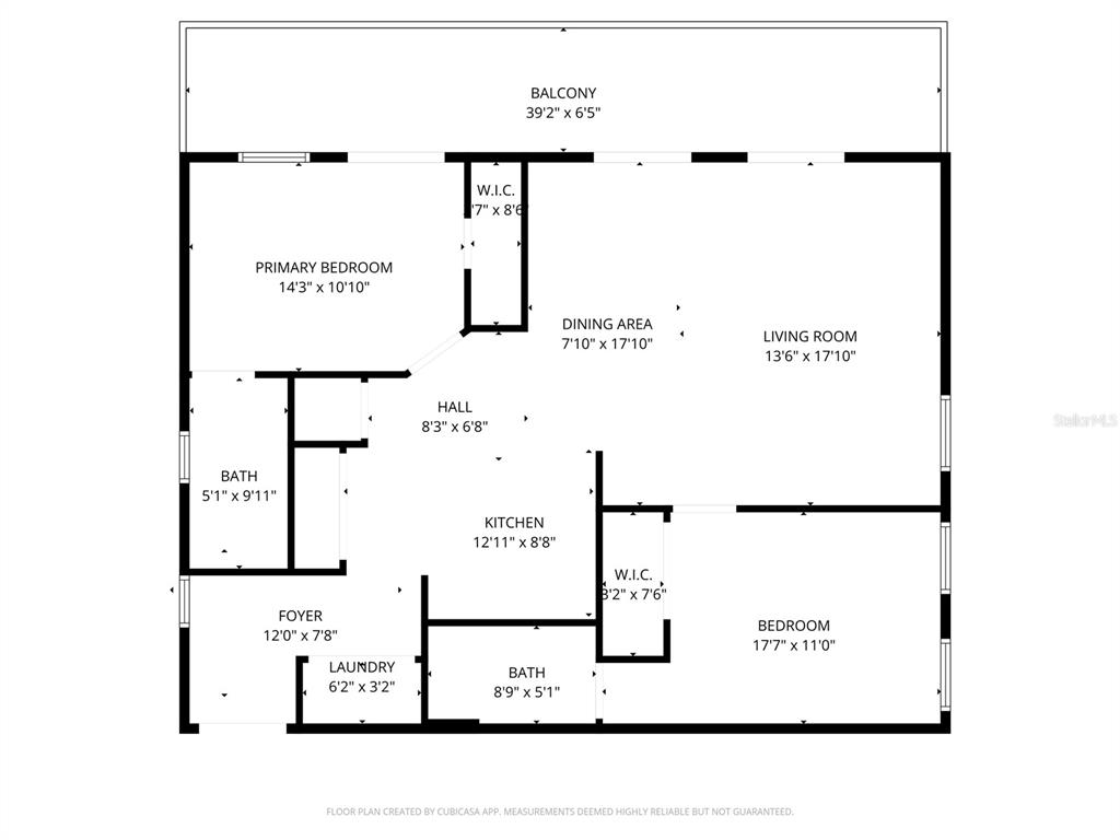 This is a floor plan showing a two-bedroom apartment with a balcony and two bathrooms — 507 NW 39TH ROAD UNIT 114, GAINESVILLE, FL