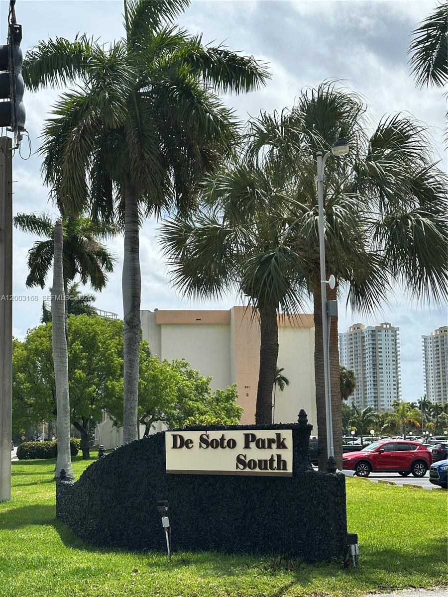 A sign for De Soto Park South stands in front of palm trees and buildings — 701 Three Islands Blvd # 110, Hallandale Beach FL 33009, HALLANDALE BEACH, FL