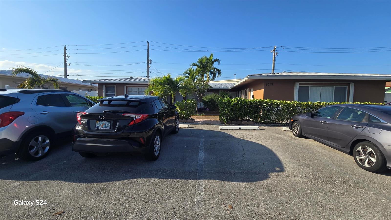 A parking lot sits in front of a single-story building with a hedge — 1019 SE 3rd Street # 3, Deerfield Beach FL 33441, DEERFIELD BEACH, FL