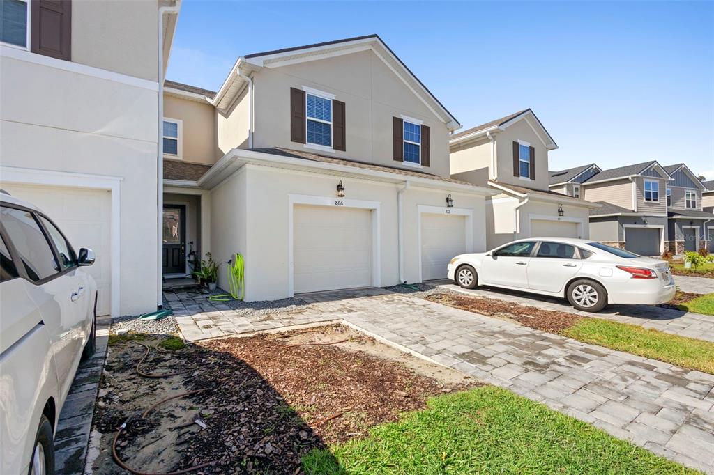 866 SPRING PALMS LOOP, ORLANDO, FL — photo 2 of 26
