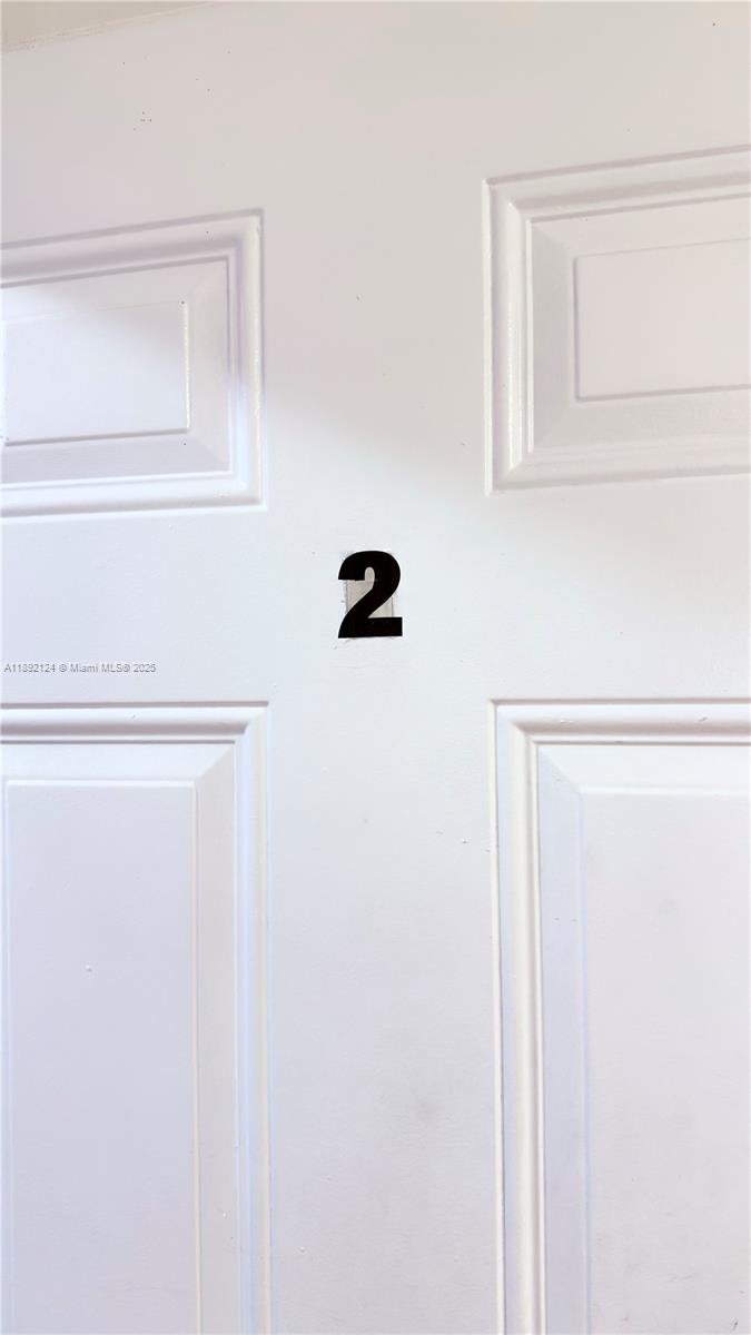 A white interior door features a black number two attached to its center — 545 Michigan Ave # 2, Miami Beach FL 33139, MIAMI BEACH, FL