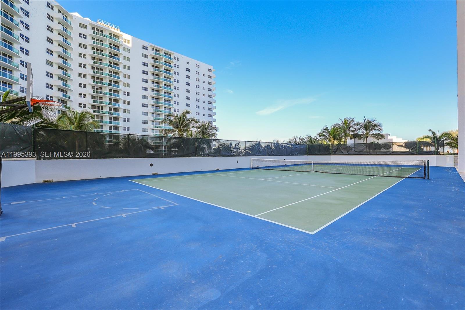 A multi-purpose outdoor court features a tennis net and a basketball hoop — 3101 S Ocean Dr # 1904, Hollywood FL 33019, HOLLYWOOD, FL