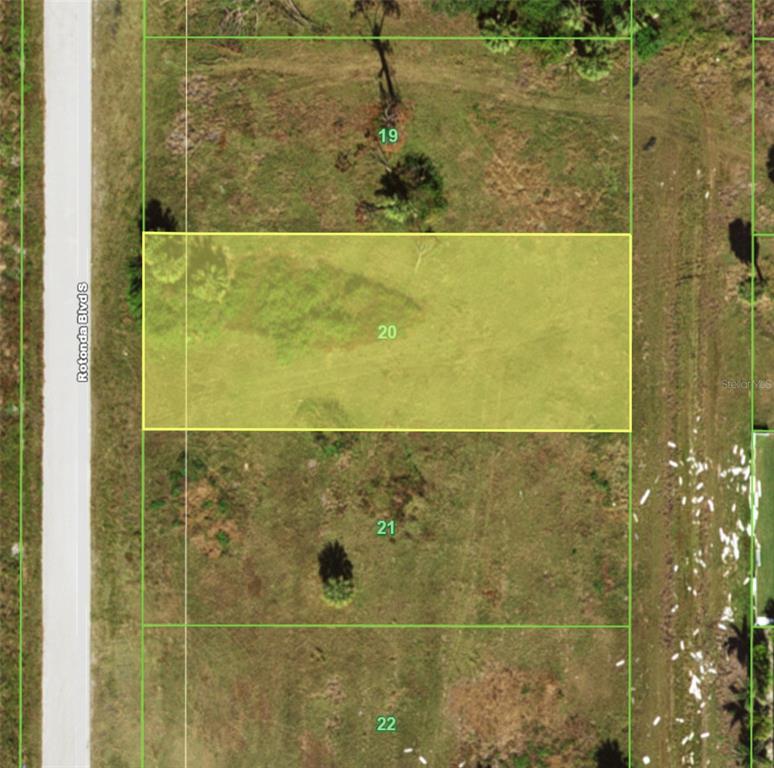 This is an aerial map showing a highlighted rectangular land parcel labeled 20 — 185 ROTONDA BOULEVARD S, ROTONDA WEST, FL