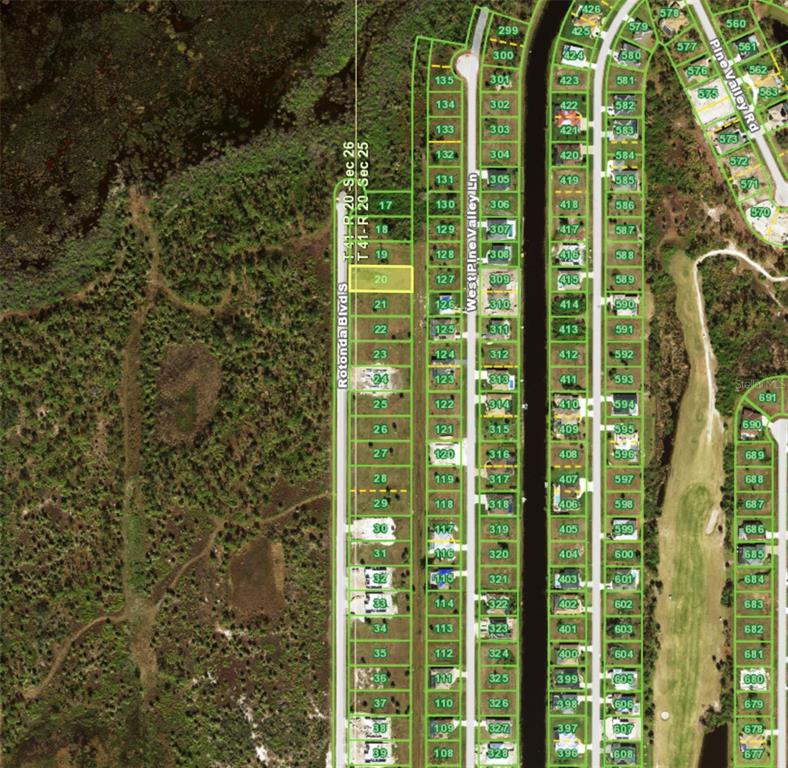 This is an aerial map showing residential lots and a canal in a neighborhood — 185 ROTONDA BOULEVARD S, ROTONDA WEST, FL