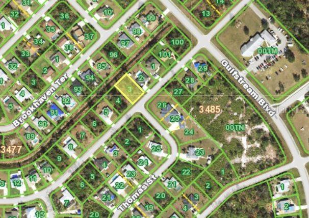 This is an aerial map showing a vacant lot highlighted in yellow within a residential neighborhood — 7313 CASTLEBERRY TERRACE, ENGLEWOOD, FL