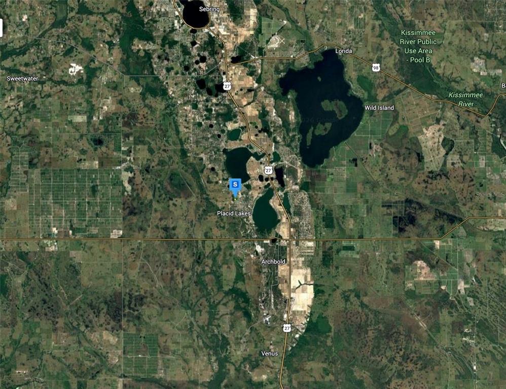 This is a satellite map showing the area around Placid Lakes and Lake June in Florida — 390 SHEPPARD ROAD NW, LAKE PLACID, FL
