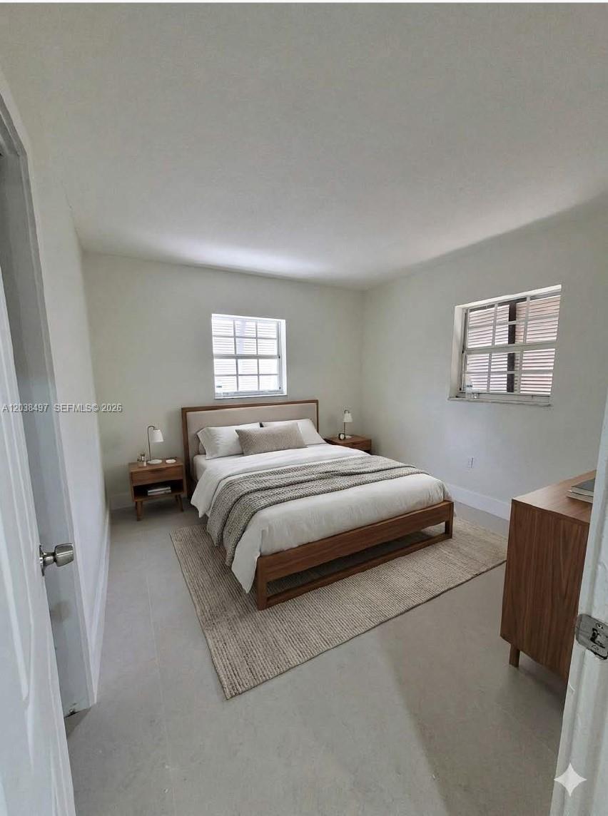 This room features light-colored tile flooring, recessed lighting, a ceiling fan, and white walls — 18000 SW 175th St # 18002, Miami FL 33187, MIAMI, FL