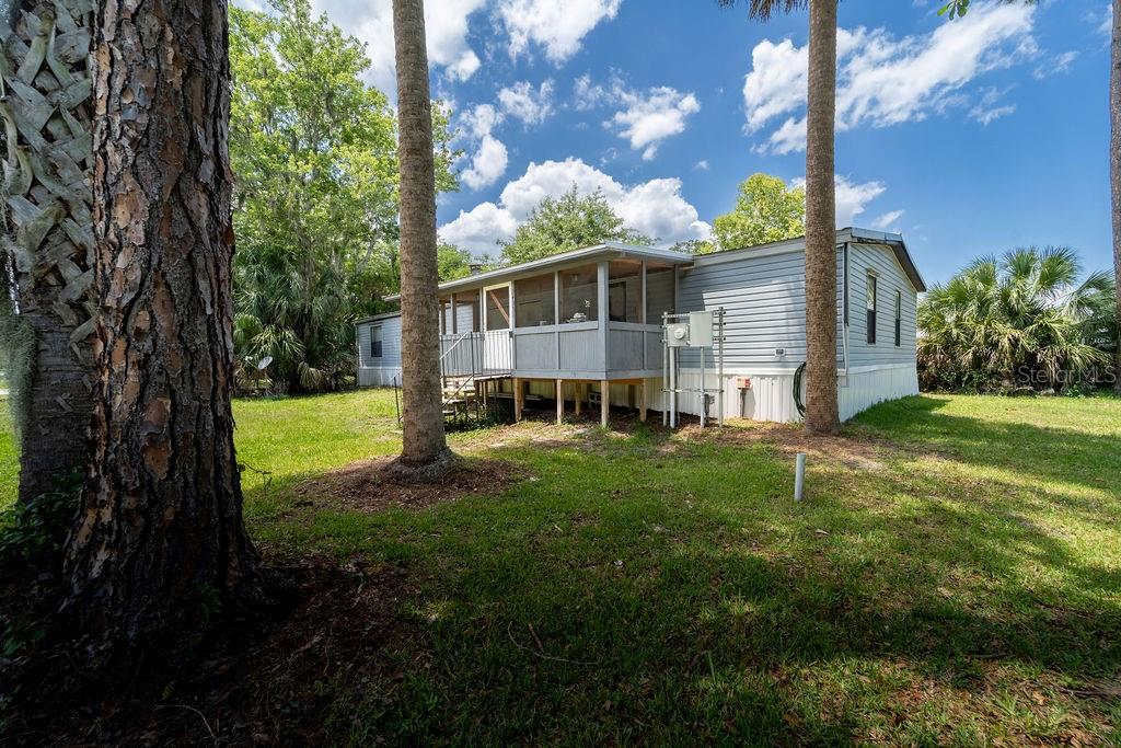 24031 ARMADILLO ROAD, ASTOR, FL — photo 2 of 30