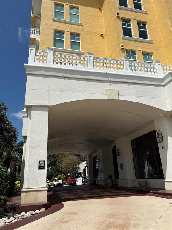 The entrance to a building features double glass doors, potted plants, and a tiled floor — 345 BAYSHORE BOULEVARD UNIT 403, TAMPA, FL