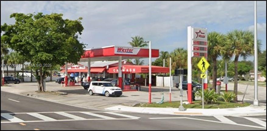 A Westar gas station and car wash sit on a corner lot with palm trees — Confidential, North Miami FL 33161, NORTH MIAMI, FL