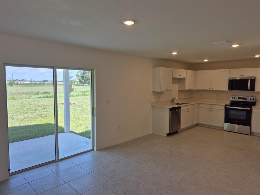 8813 PINE BARK WAY, WILDWOOD, FL — photo 4 of 6