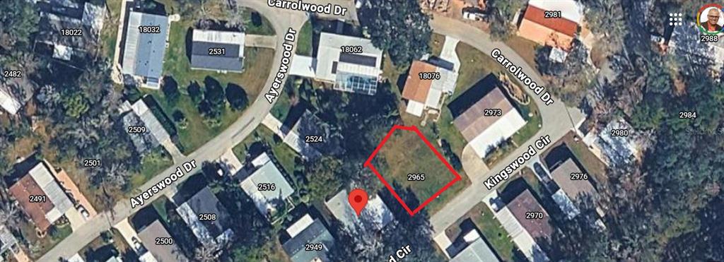 This is an aerial map view showing a vacant residential lot outlined in red — KINGSWOOD CIRCLE, BROOKSVILLE, FL