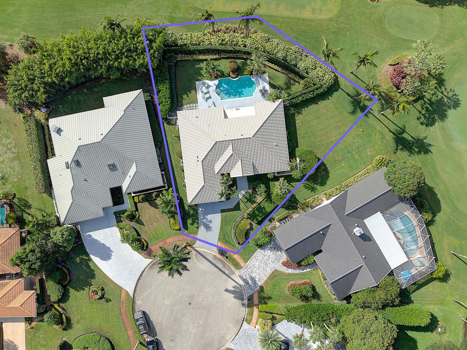 An aerial view shows a house with a pool and yard outlined in purple — 7946 Shelby Circle, Boca Raton FL 33496, BOCA RATON, FL