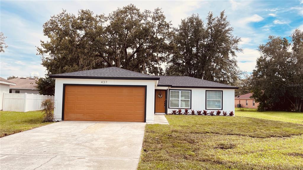 437 EAGLE DRIVE, POINCIANA, FL — photo 2 of 23