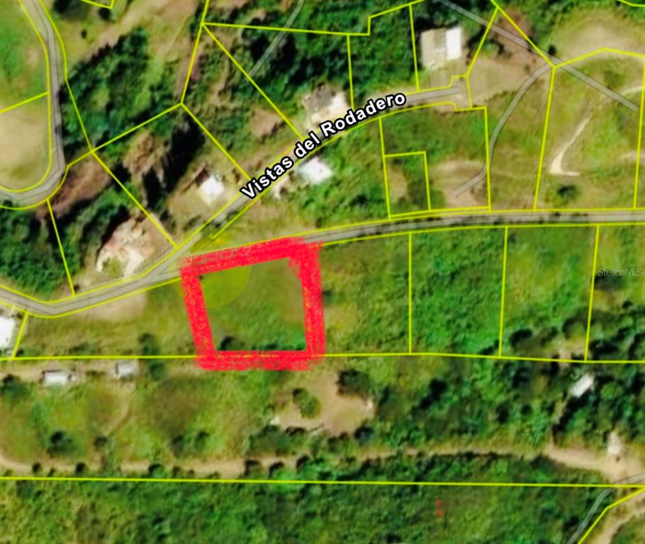 This is an aerial map showing a highlighted plot of land next to a road — URB.VISTAS DEL RODADERO, YAUCO, PR