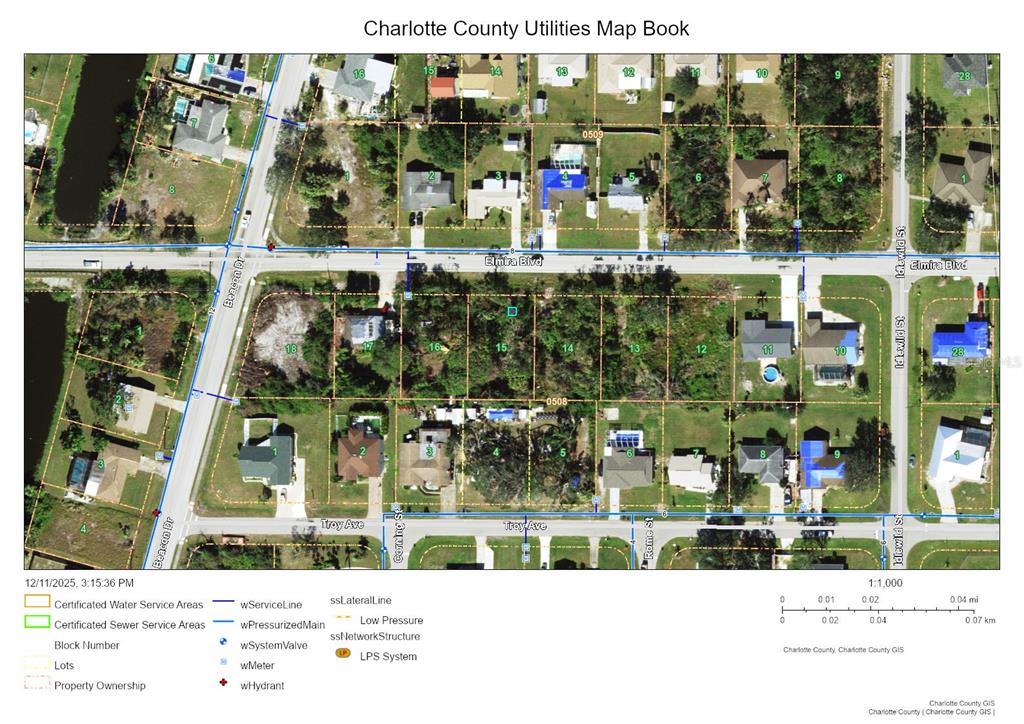 This is a utility map showing property lots, street names, and infrastructure lines in a neighborhood — 22543 ELMIRA BOULEVARD, PORT CHARLOTTE, FL