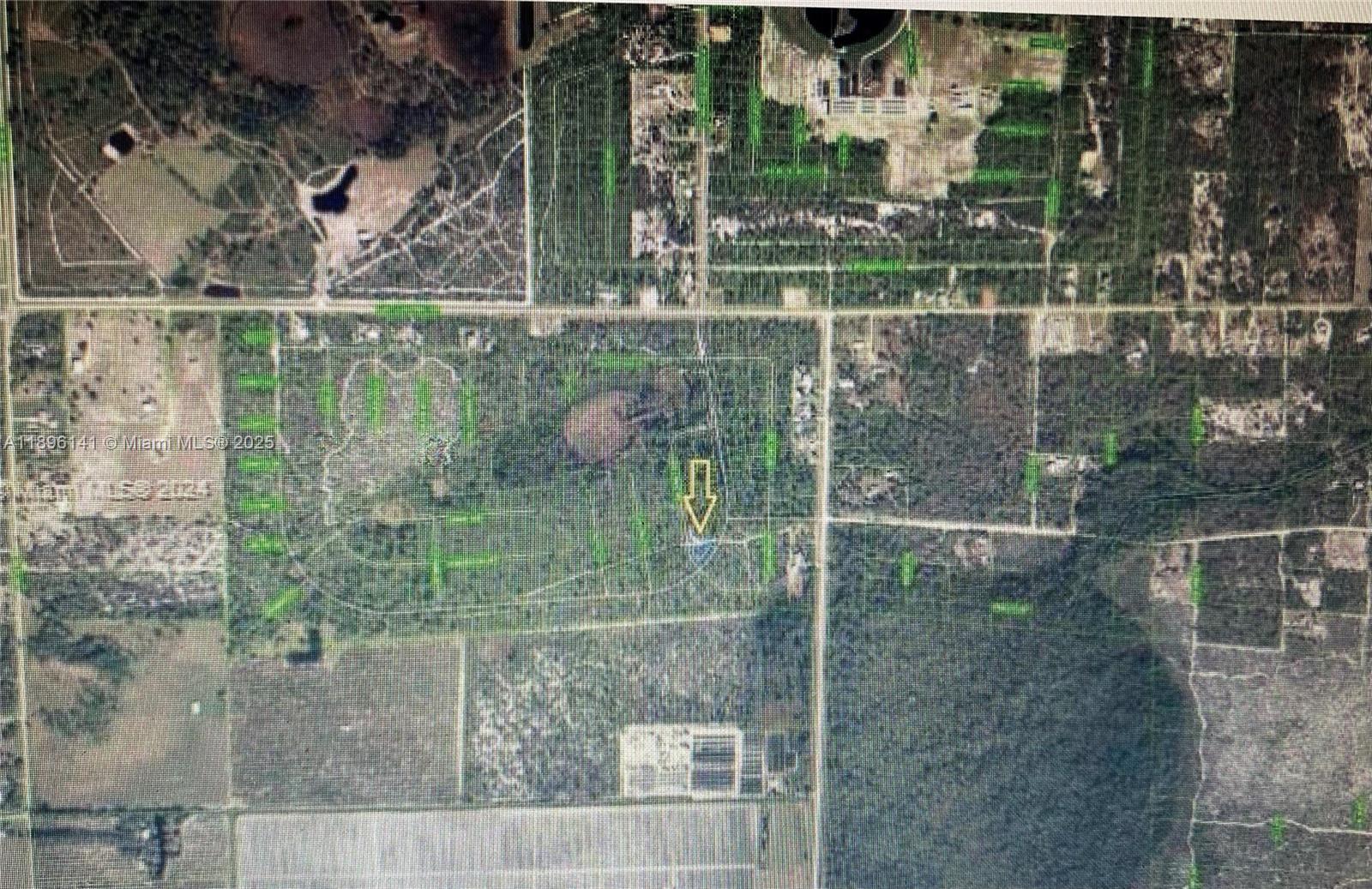 This is an aerial map showing a plot of land marked with a yellow arrow — 1178 SOFT SAND DR, Sebring FL 33875, SEBRING, FL