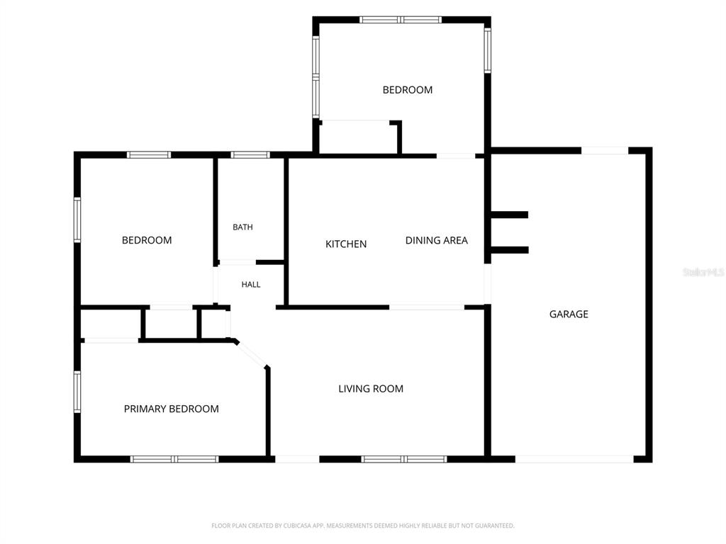 This is a floor plan showing a house with a garage, kitchen, and three bedrooms — 6714 SANDRA DRIVE, PORT RICHEY, FL